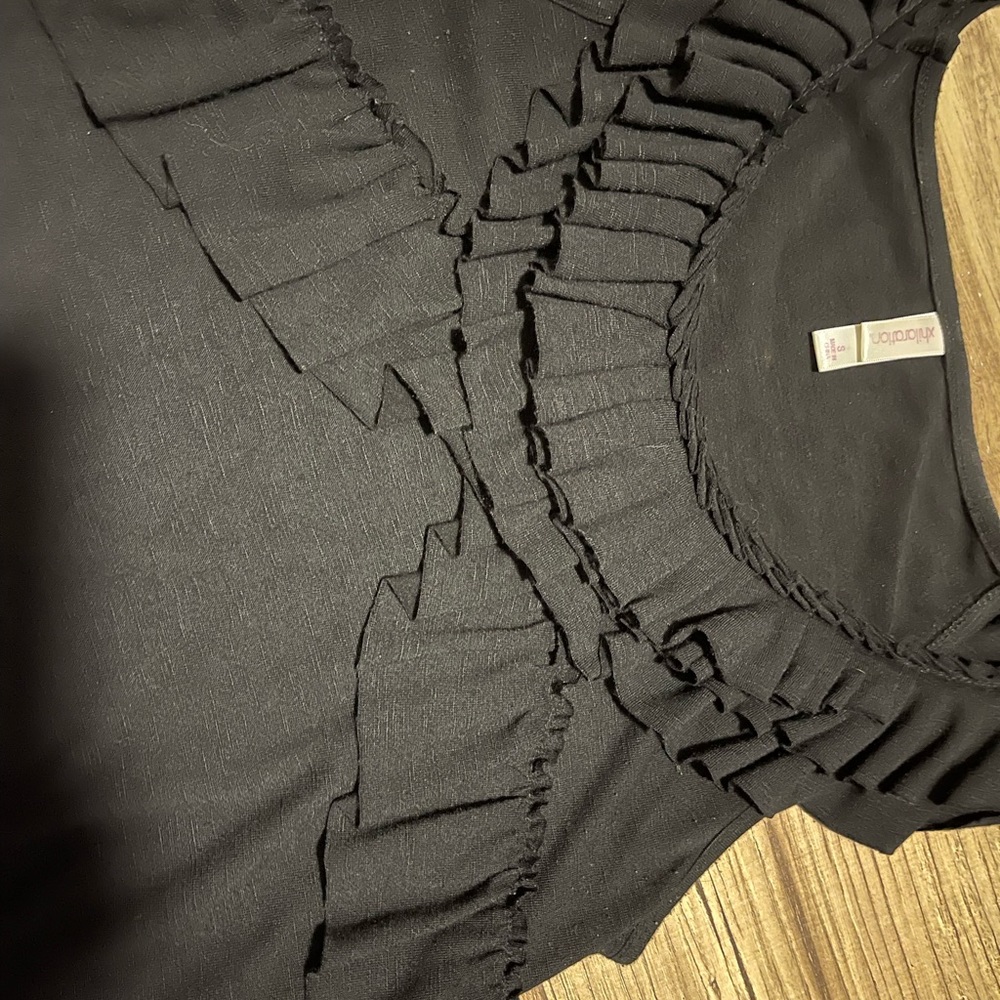 Black ruffle sleeve tank woman’s